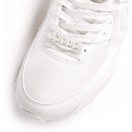 Sparkling Crystal Shoe Tag - A stylish white sneaker featuring the Sparkling Crystal Shoe Tag with clear gems threaded through the laces.