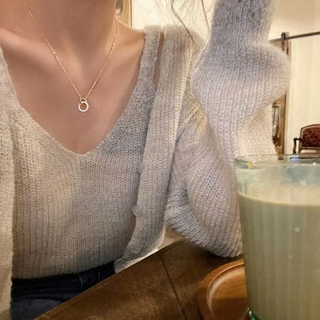 Model wearing the elegant 925 silver zircon choker necklace, showcasing its style.