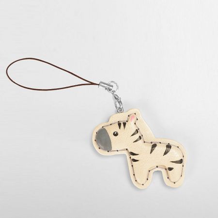A playful wooden tiger keychain with distinctive stripes and a sturdy cord.