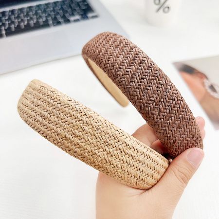 Two brown woven hairbands displayed on a white background.