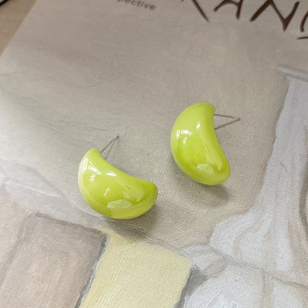 A pair of bright yellow curved earrings with a glossy finish, part of the pop style summer collection.