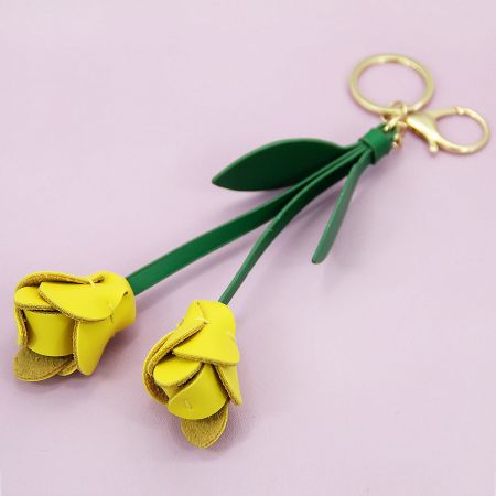 Sunny yellow PU leather tulip keychain, a beautiful flower charm for purses and bags.