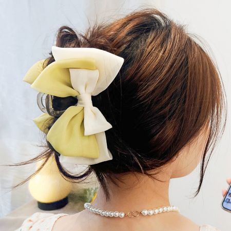 Two Layers Double Color Fabric Bow Knot with Plastic Hair Claw Clips (5 pcs) - A close-up of a stylish two-layer, double-color fabric hair bow in yellow and white, attached to a plastic claw clip, from JR Fashion Accessories.