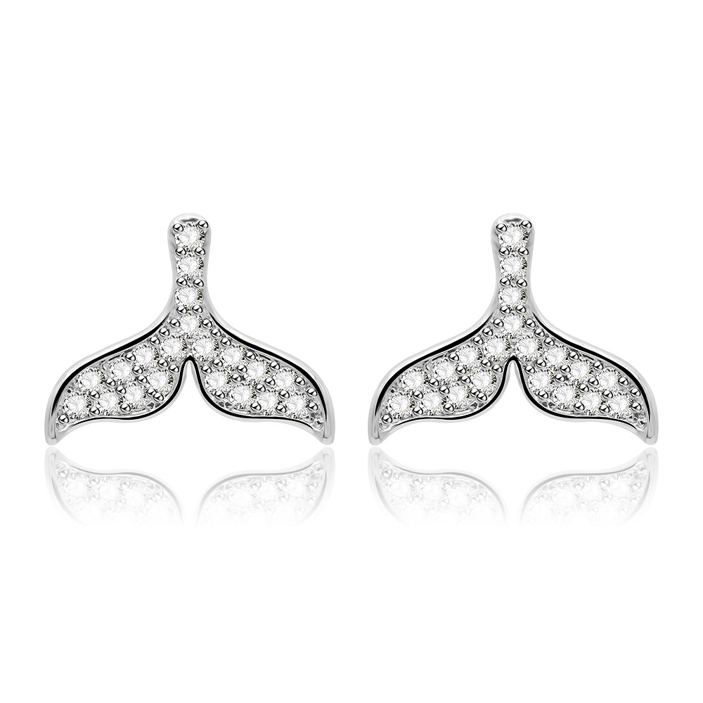 A pair of elegant whale tail stud earrings in rhodium-plated brass, intricately detailed with sparkling cubic zirconia stones.