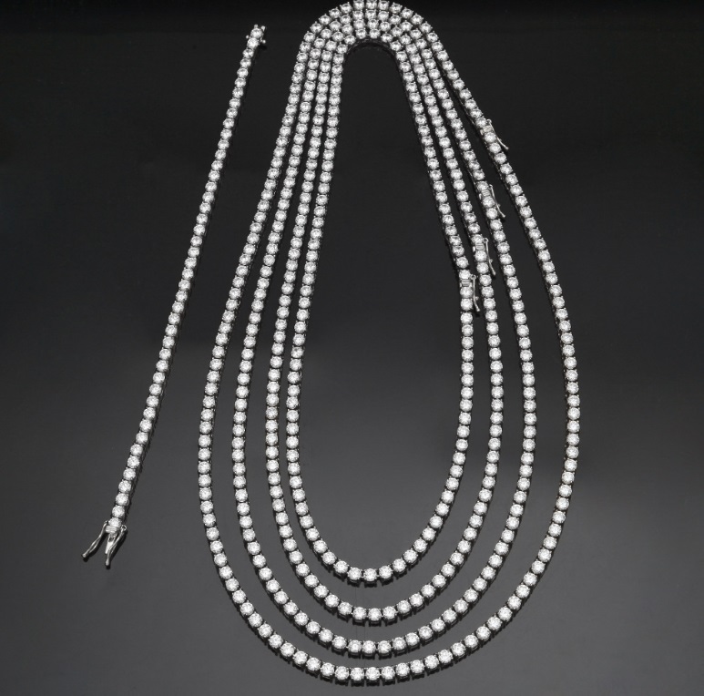 A luxurious multi-strand Hip Hop Rapper Style Bling Zircon Tennis Chain, showcasing its intricate design and brilliant stones.