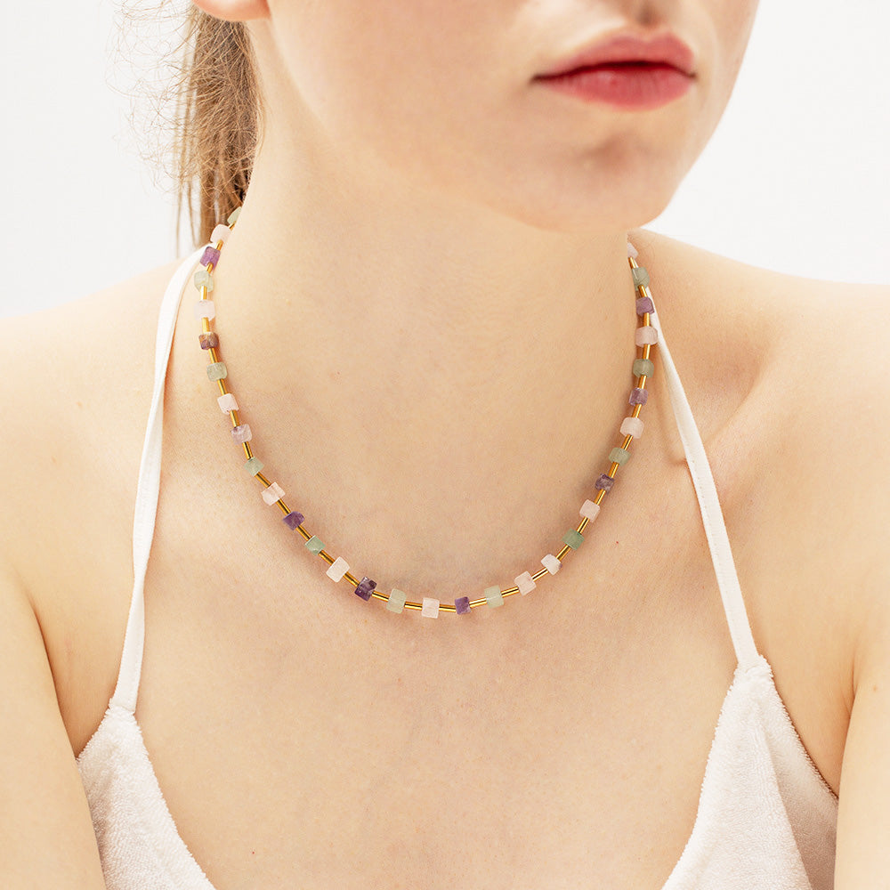 A model wearing the stainless steel multicolor square natural stones beaded boho necklace, showcasing its vibrant colors and chic style.