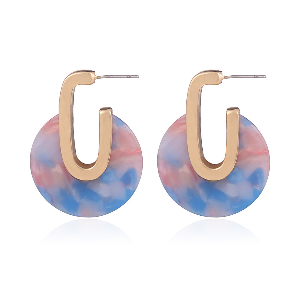 A pair of Sky Blue and Clouds Inspired Geometric Hoops with gold accents, made of brass and resin.