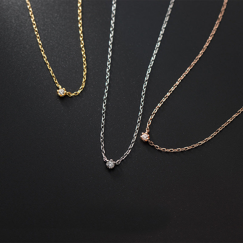 A set of five 925 sterling silver necklaces with a single CZ stone, displayed in silver, gold, and rose gold finishes.