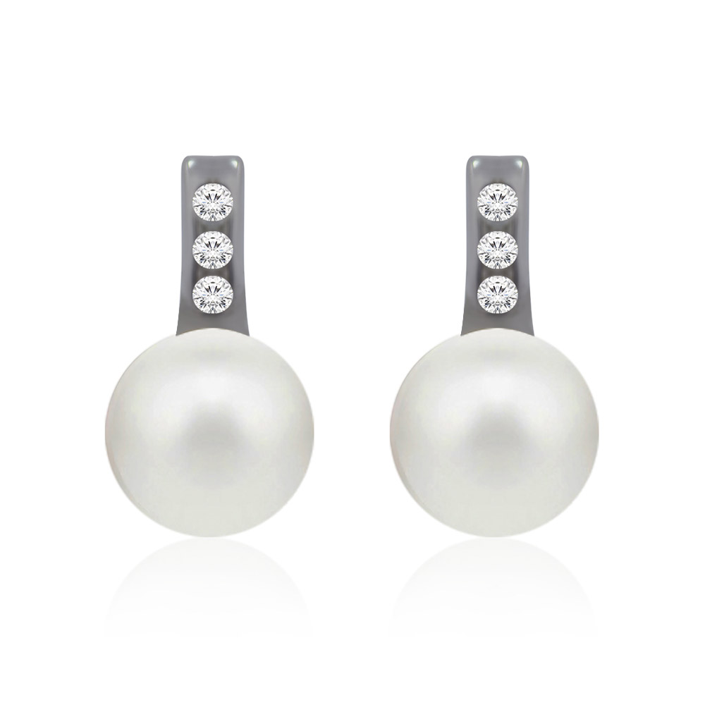 A close-up view of the 8.5MM Shell Pearl Earrings, showcasing the lustrous white pearl and the sparkling cubic zirconia accents on the rhodium-plated setting.