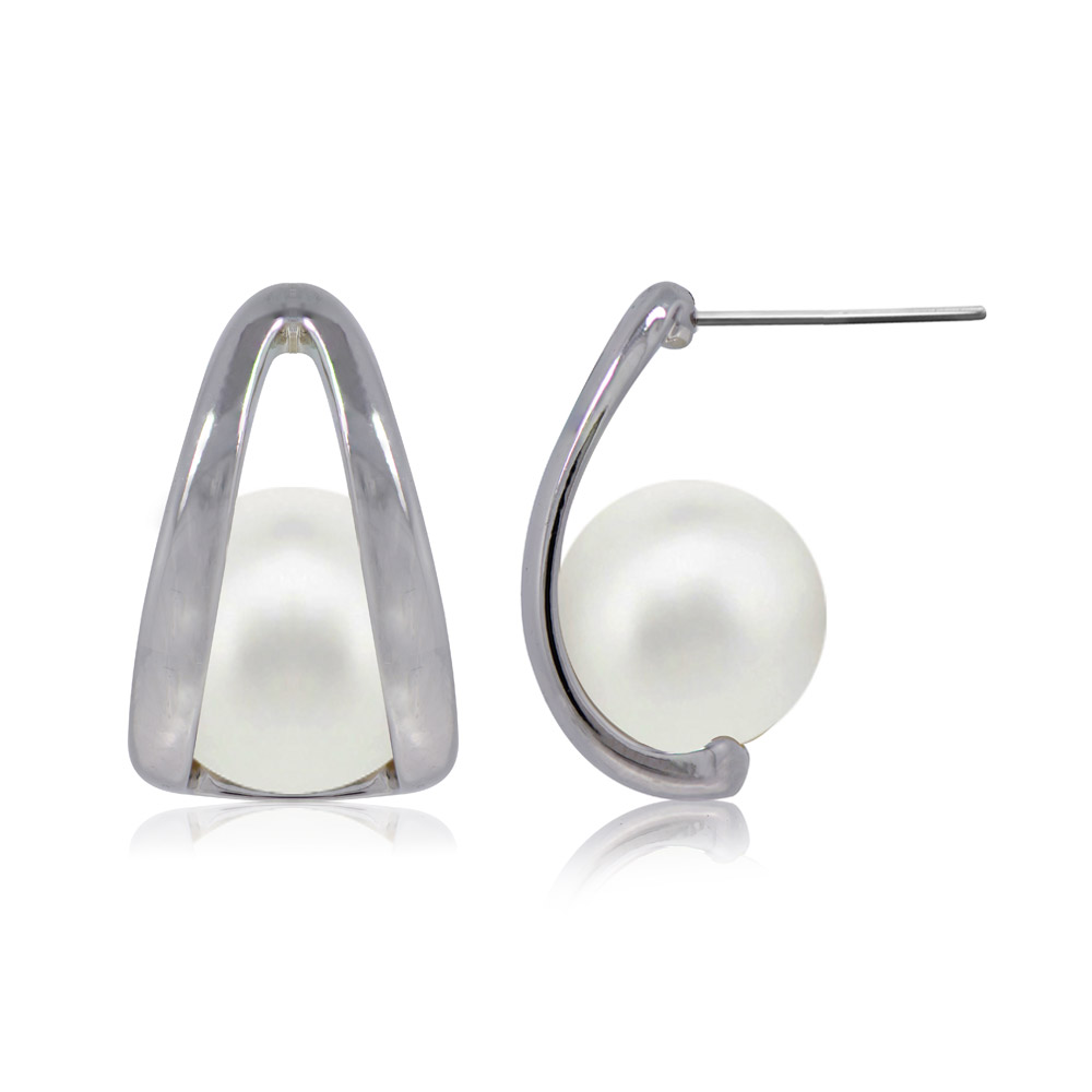 A pair of modern Hug Pearl Stud Earrings with a minimalist silver rhodium-plated brass setting and a large white pearl.
