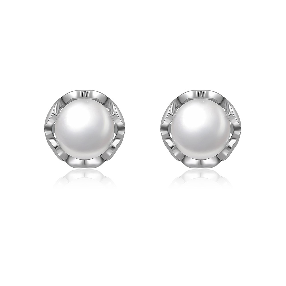 A pair of minimalist pearl ear studs featuring 8mm white shell pearls set in oxidized 925 sterling silver, displayed against a clean white background.