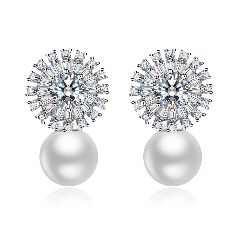 Front view of the Rhodium Flower Pearl Earrings, showcasing the central white pearl surrounded by a sunburst design of sparkling white cubic zirconia gemstones set in rhodium plating.