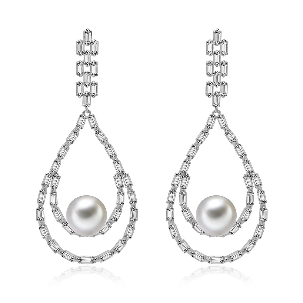 Front view of the Statement Pearl Dangling Earrings, showcasing the teardrop design with a central shell pearl and surrounding white cubic zirconia stones.