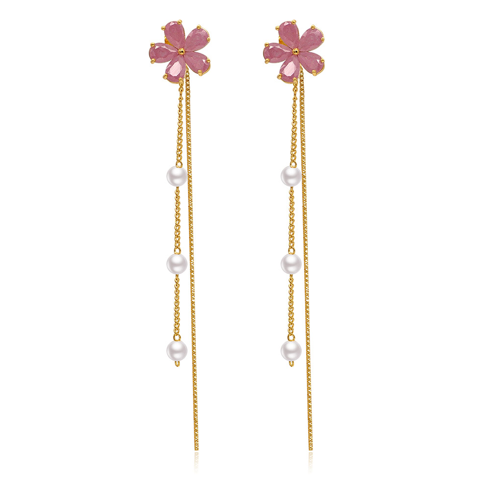 A close-up of the Pearl Blossomed Long Dangle Earrings, showcasing the pink flower-shaped tops and delicate gold chains with white pearls.