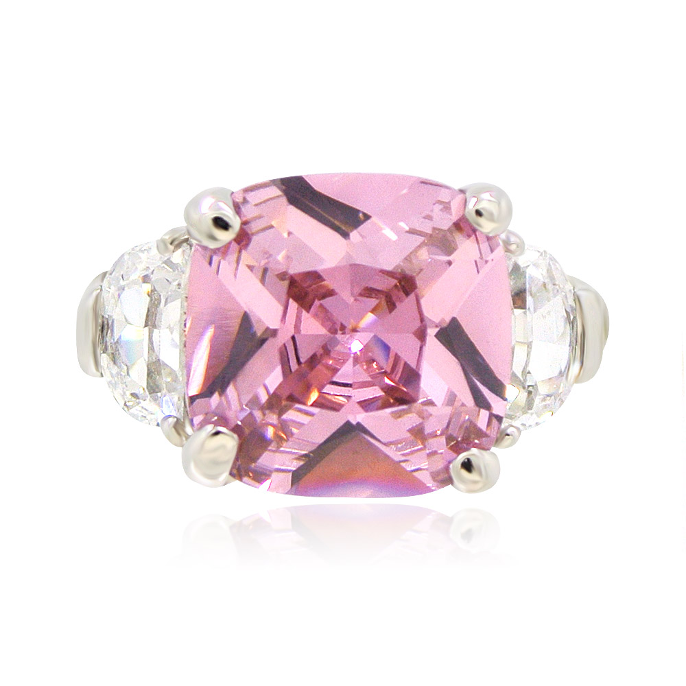 A close-up view of the Pink Cushion Cut Promise Ring, showcasing its brilliant 12x12mm pink gemstone and rhodium-plated brass band.