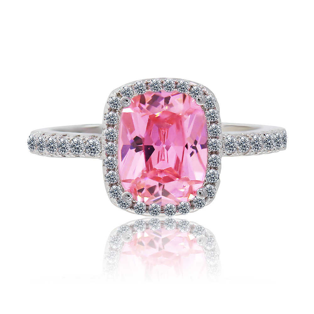Front view of the Pink Enchant Ring, showcasing its large pink cubic zirconia stone set in a rhodium-plated brass band with sparkling accent stones.