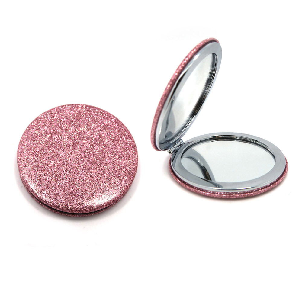 Personalized Glitter Foldable Compact Mirror in pink glitter, showing both the open and closed views with standard and 2x magnification.