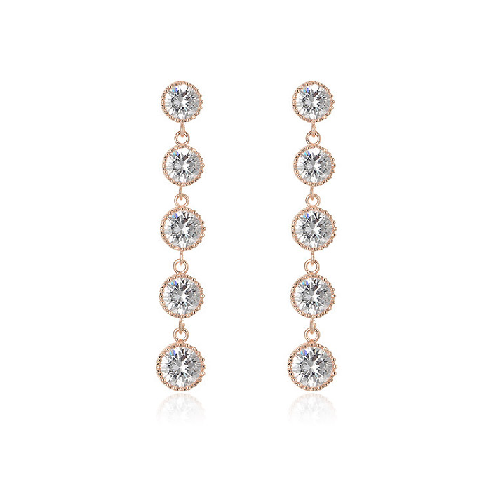 A pair of fine elegant long rhinestone bride earrings (JRE-068) in rose gold, featuring a vertical arrangement of five clear, sparkling crystals, perfect for wedding jewelry.