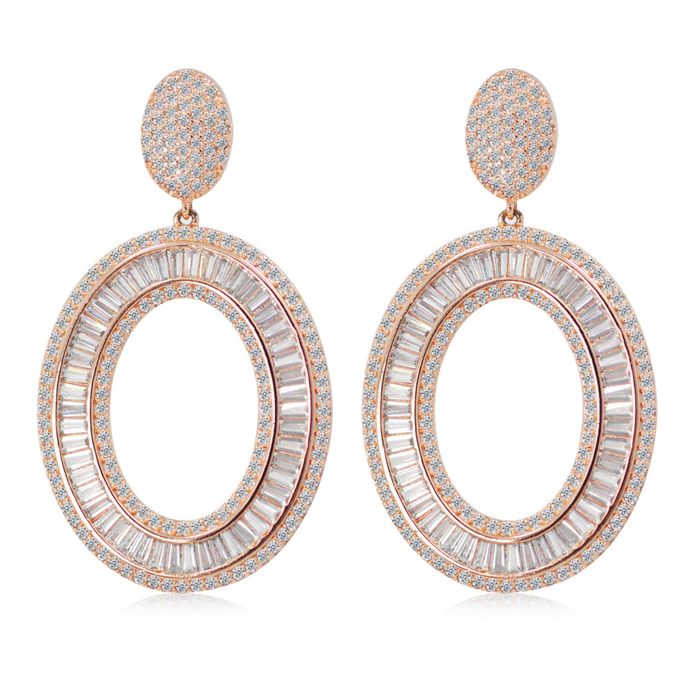 A pair of Oval Drops Of Fabulous earrings in rose gold, featuring an elegant double-layered oval design with sparkling white cubic zirconia baguette stones.