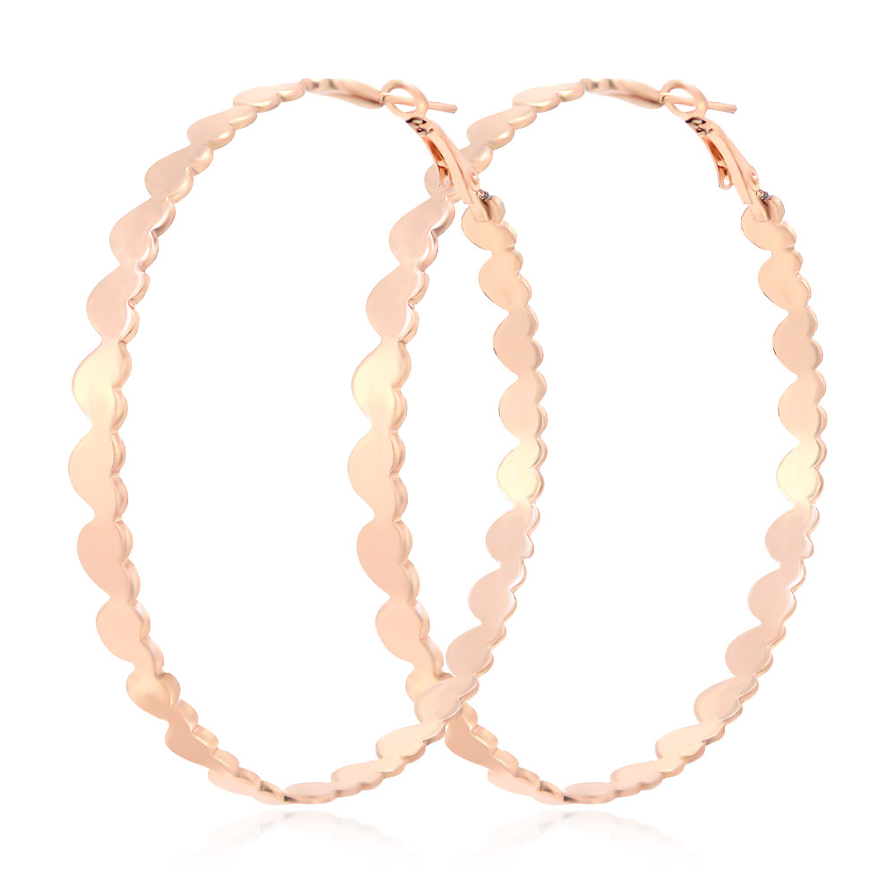 A pair of Endless Love Hoop Earrings in rose gold, showcasing their unique twisted and wavy design on a clean white background.