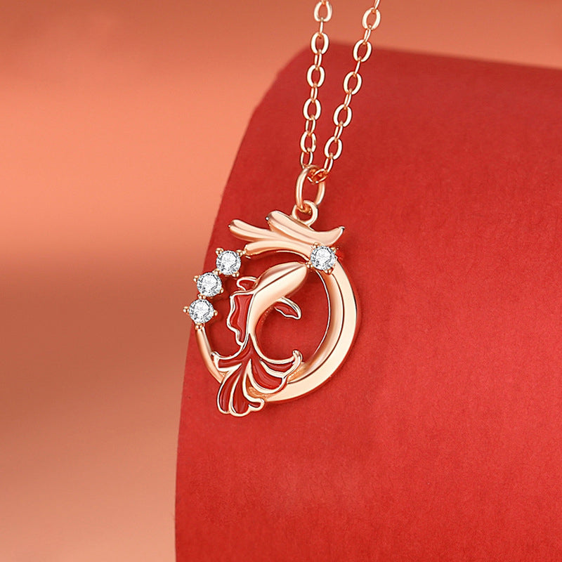 A detailed close-up of the 925 sterling silver Chinese goldfish charm necklace, showcasing the intricate design of the koi fish pendant with delicate diamond accents.