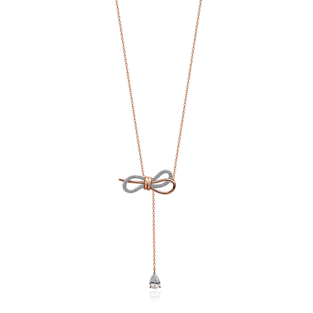 A stunning Tied Ribbon Bow Dangle Necklace in two-tone rose gold and rhodium, featuring a pave-set cubic zirconia bow and a dangling teardrop crystal.