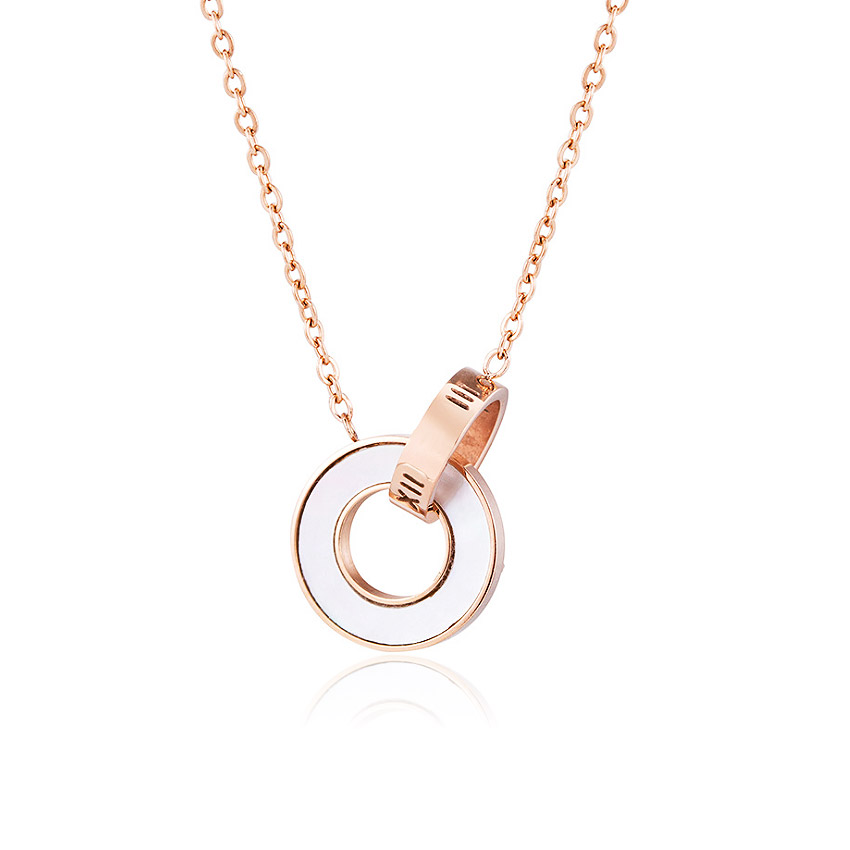 Close-up of the Stainless Steel Chain Rings Necklace in rose gold, featuring an interlocking two-ring pendant with white enamel inlay.
