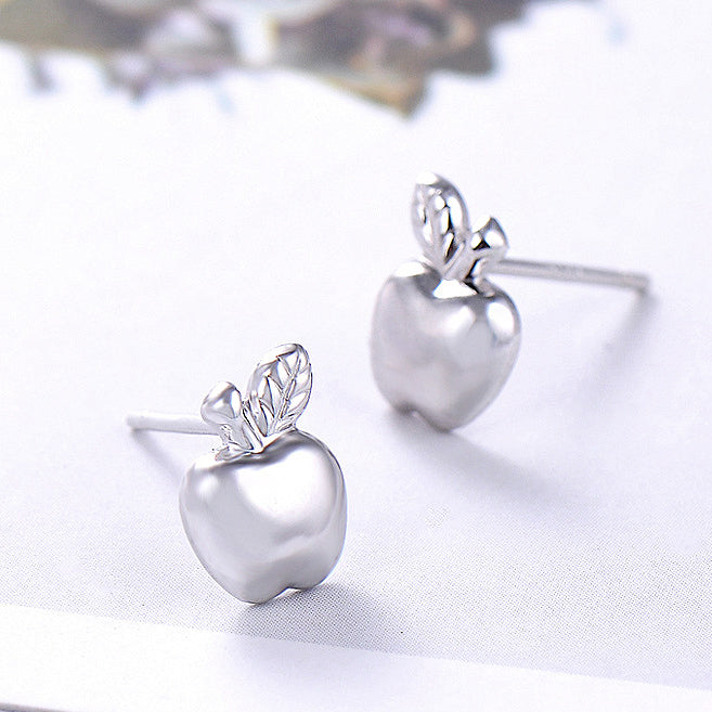 A pair of 925 sterling silver cute fruit apple stud earrings with delicate leaf details, shown on a white background.