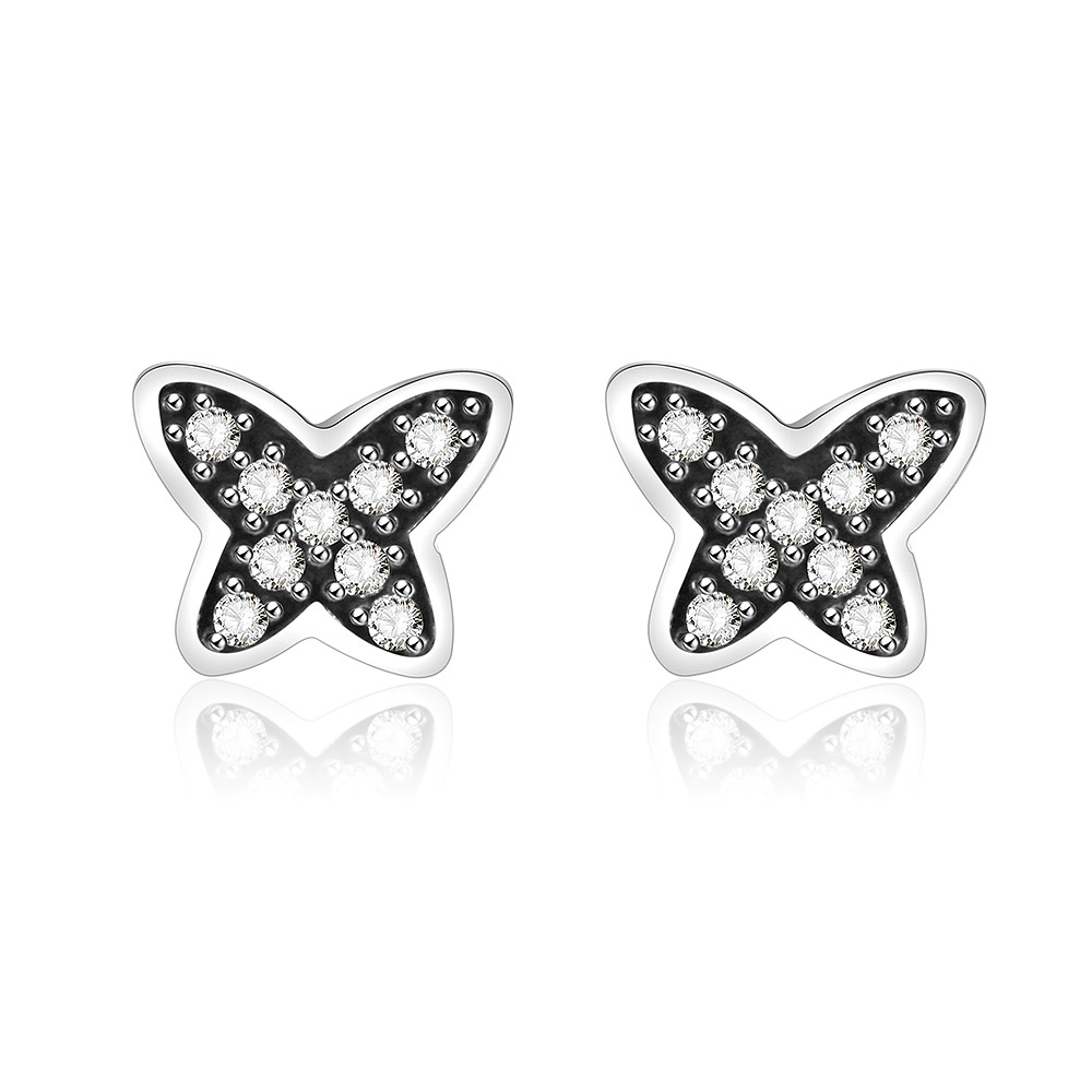 A detailed close-up of the Tiny Butterfly Silver Zirconia Stud Earrings, showcasing the intricate butterfly design and sparkling clear gemstones on a 925 sterling silver base.