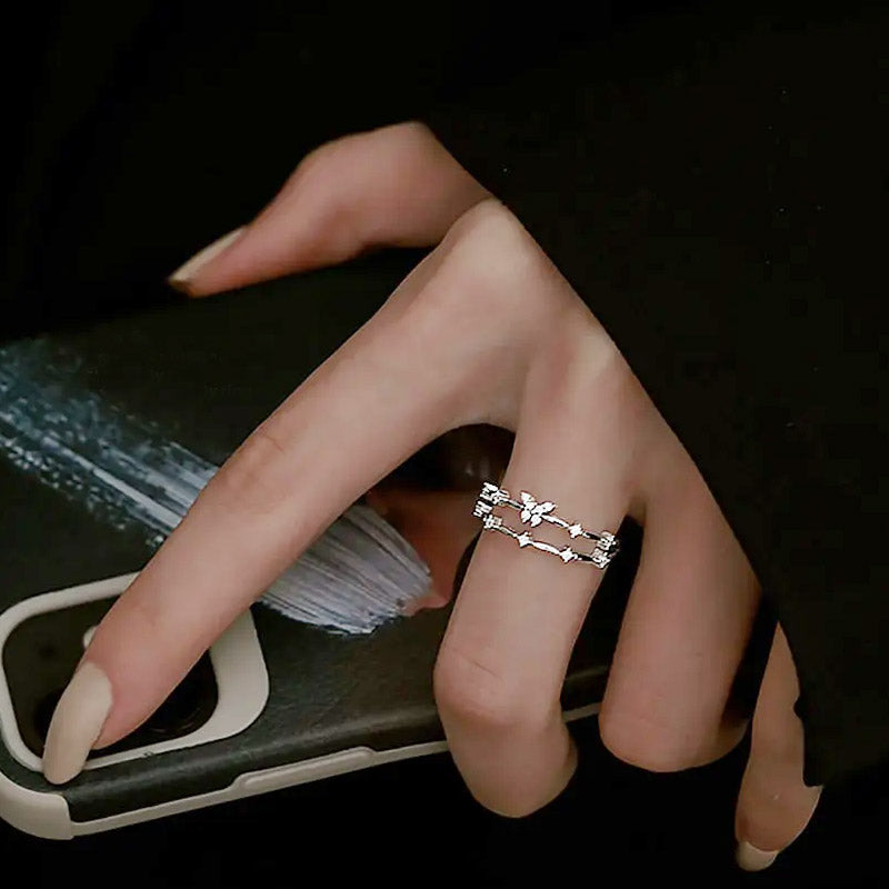 A stylish 925 sterling silver open ring featuring an intricate double-layer butterfly and star design, part of a bulk set.