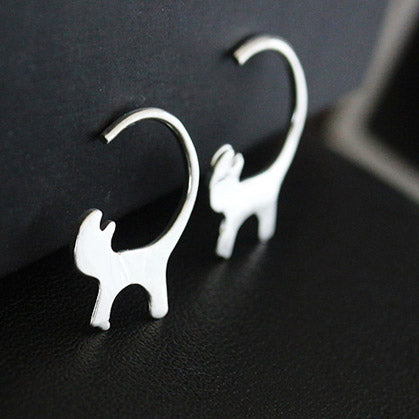 A pair of charming silver-plated brass earrings shaped like cute cat tails, perfect for wholesale buyers.