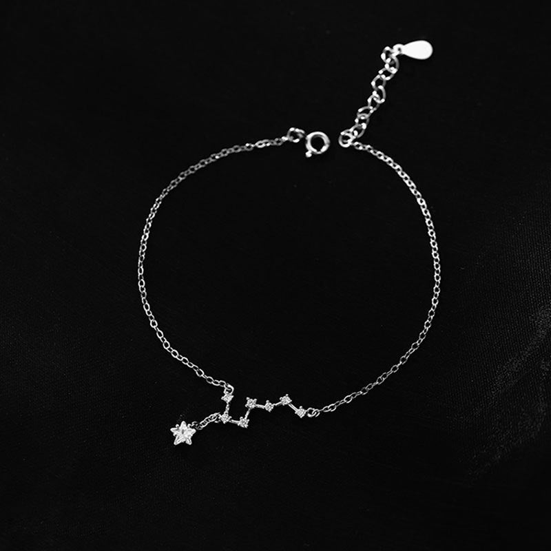 A delicate 925 sterling silver bracelet from the Polaris Big Dipper set, featuring a constellation design with sparkling zircon star charms on a white background.