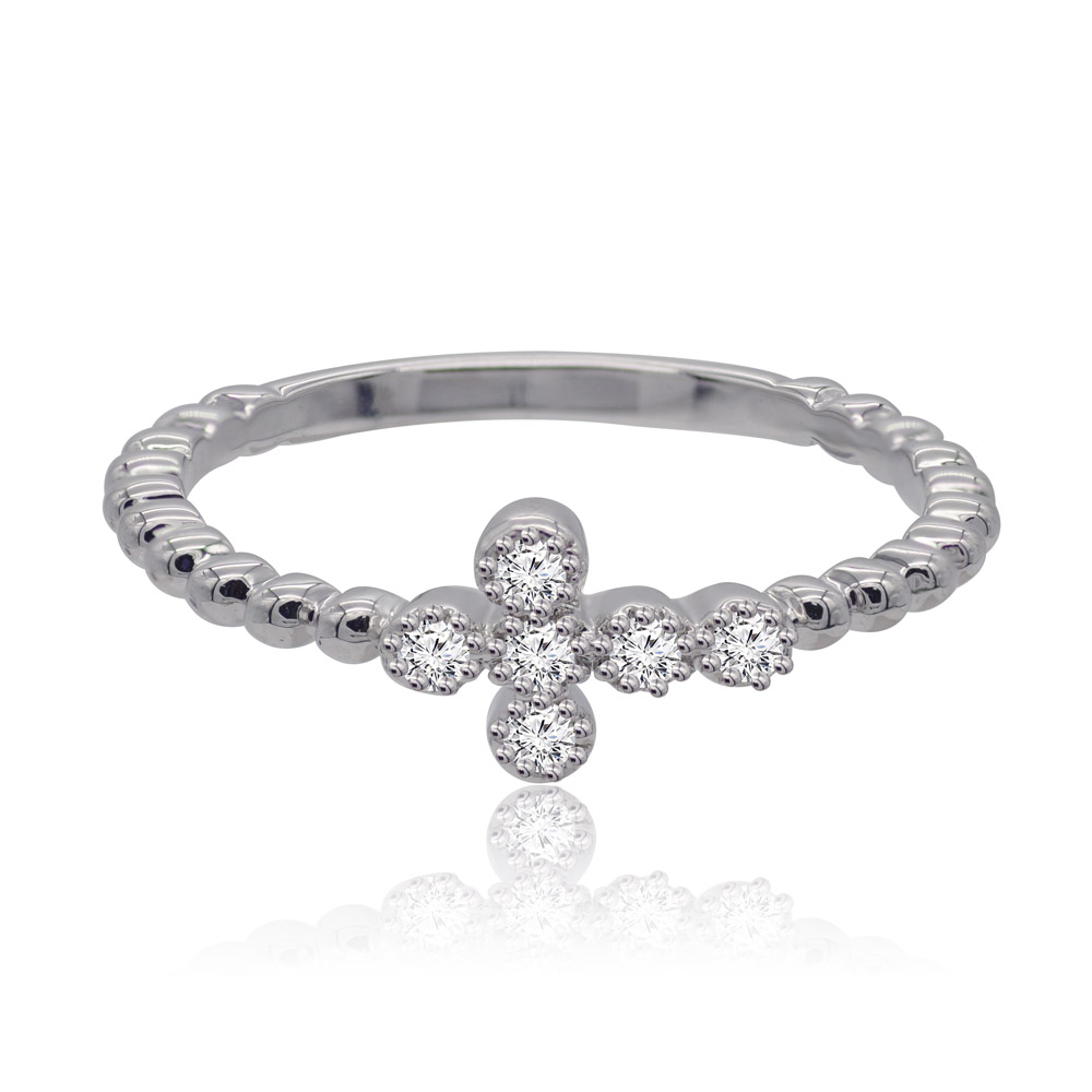 A detailed studio photograph of the Vatican Cross Bubble Band Ring, highlighting its polished rhodium finish and the central cross motif set with shimmering white cubic zirconia stones.