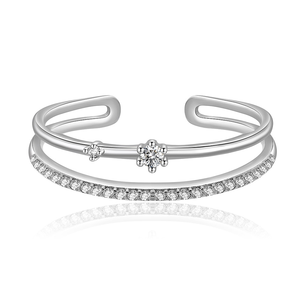 A delicate double-layered silver cuff bracelet with sparkling cubic zirconia, showcasing the elegant style of the Simple Lovely Stacking Ring.