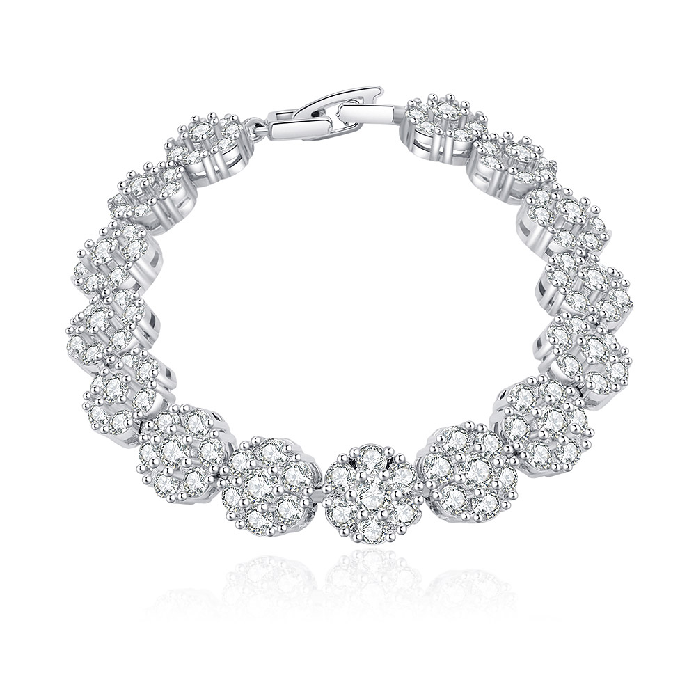 Close-up of the CZ Petal Link Bracelet, showcasing its minimalist design with rhodium-plated brass and sparkling cubic zirconia stones arranged in a petal-like pattern.