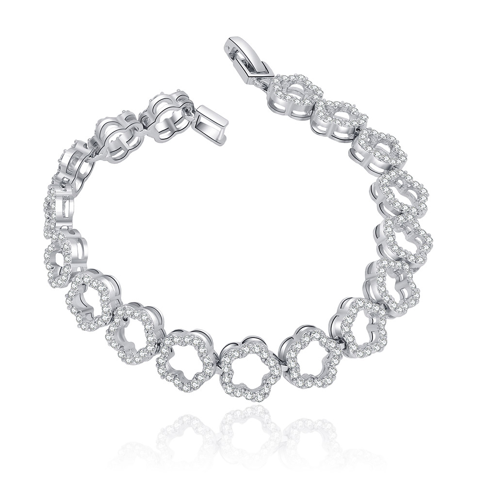 Festival Hollow Flower CZ Bracelet with interlocking flower-shaped links, crafted from rhodium-plated brass and set with sparkling white cubic zirconia.
