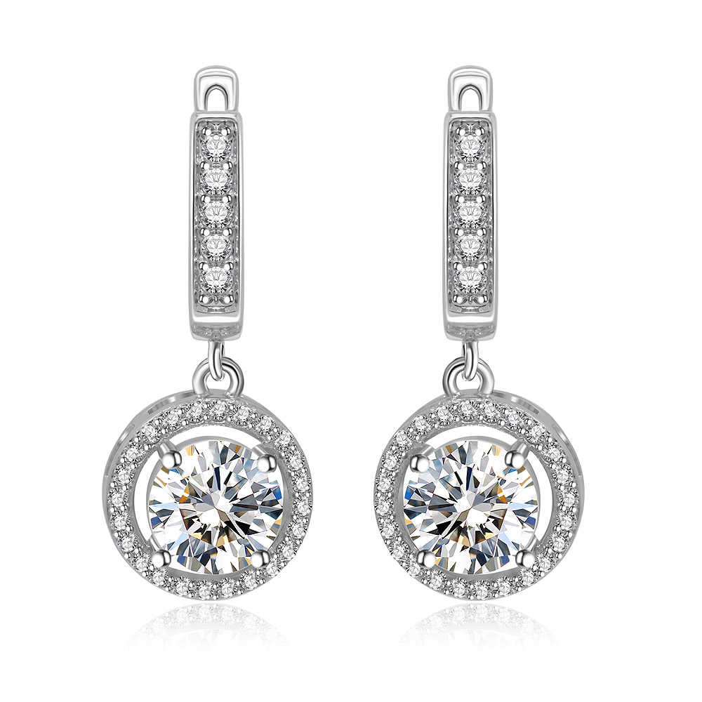 A close-up of the Round Zirconia Earrings with Pave Surround, showcasing the large central cubic zirconia stone encircled by a halo of smaller sparkling stones and the elegant rhodium-plated finish.