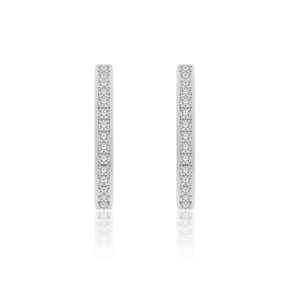 A detailed close-up of the Single Strand Micro Pave CZ Hoop Earrings, highlighting the brilliant cubic zirconia stones set in polished 925 sterling silver with rhodium plating.