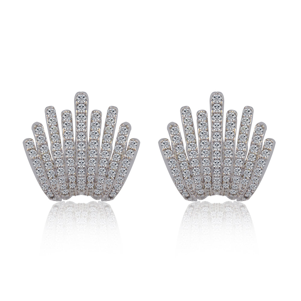 A pair of Chic Shine Studs featuring a distinctive fan-shaped design in rhodium-plated brass, encrusted with sparkling cubic zirconia stones.