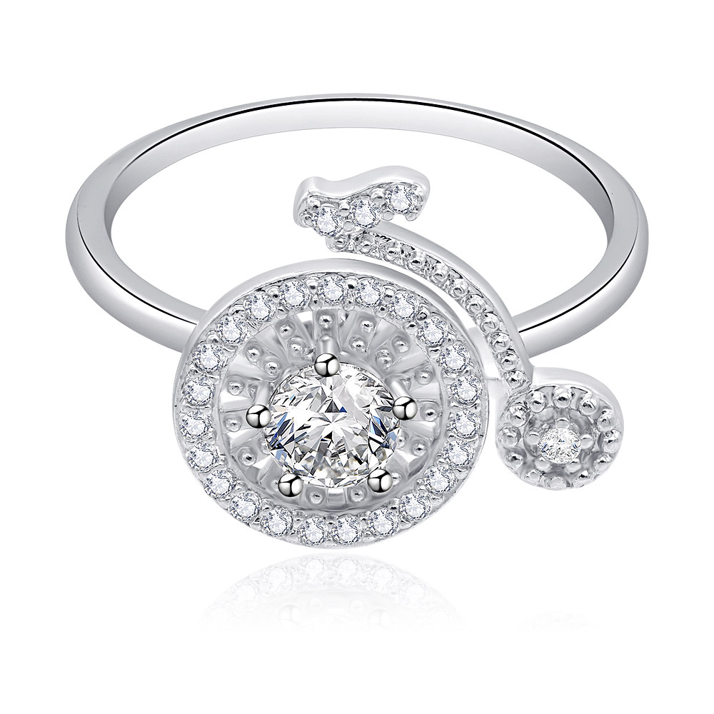 Close-up of the Spinning Bike Wheel Ring, showcasing its intricate bicycle wheel design with a central cubic zirconia stone set in a polished rhodium-plated band.