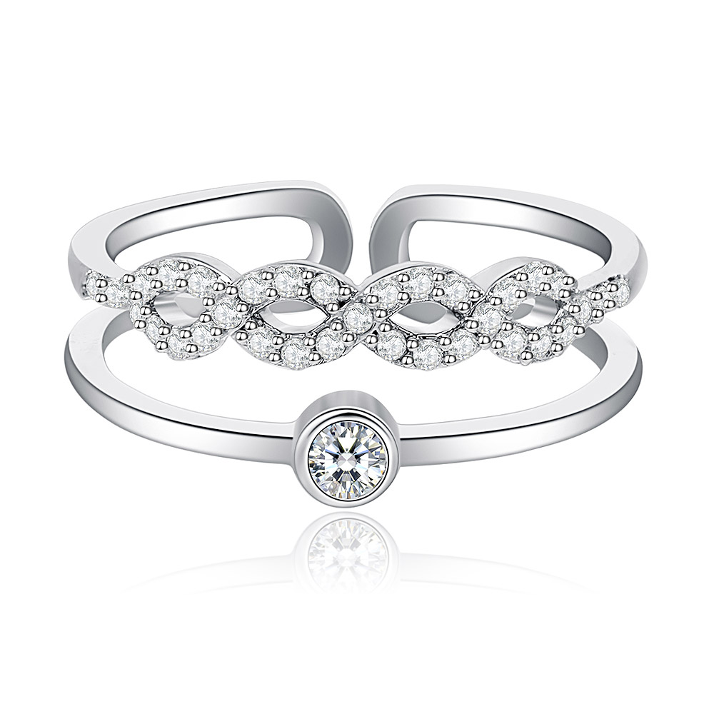 Cubic Zirconia Link Band Ring with rhodium plating, featuring a row of oval-shaped stones on a white background.
