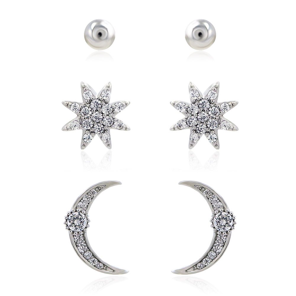 A set of three pairs of Starburst Moon Cubic Zirconia stud earrings, including silver ball, crescent moon, and star shapes.