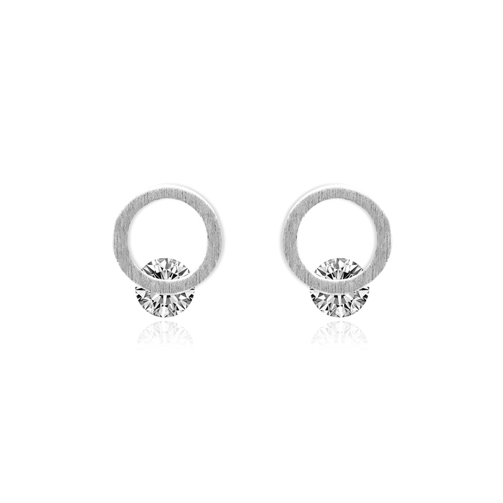 Close-up of Tiny Round Silver Plated CZ Earrings, showcasing the central sparkling cubic zirconia stone on a silver-plated brass stud.