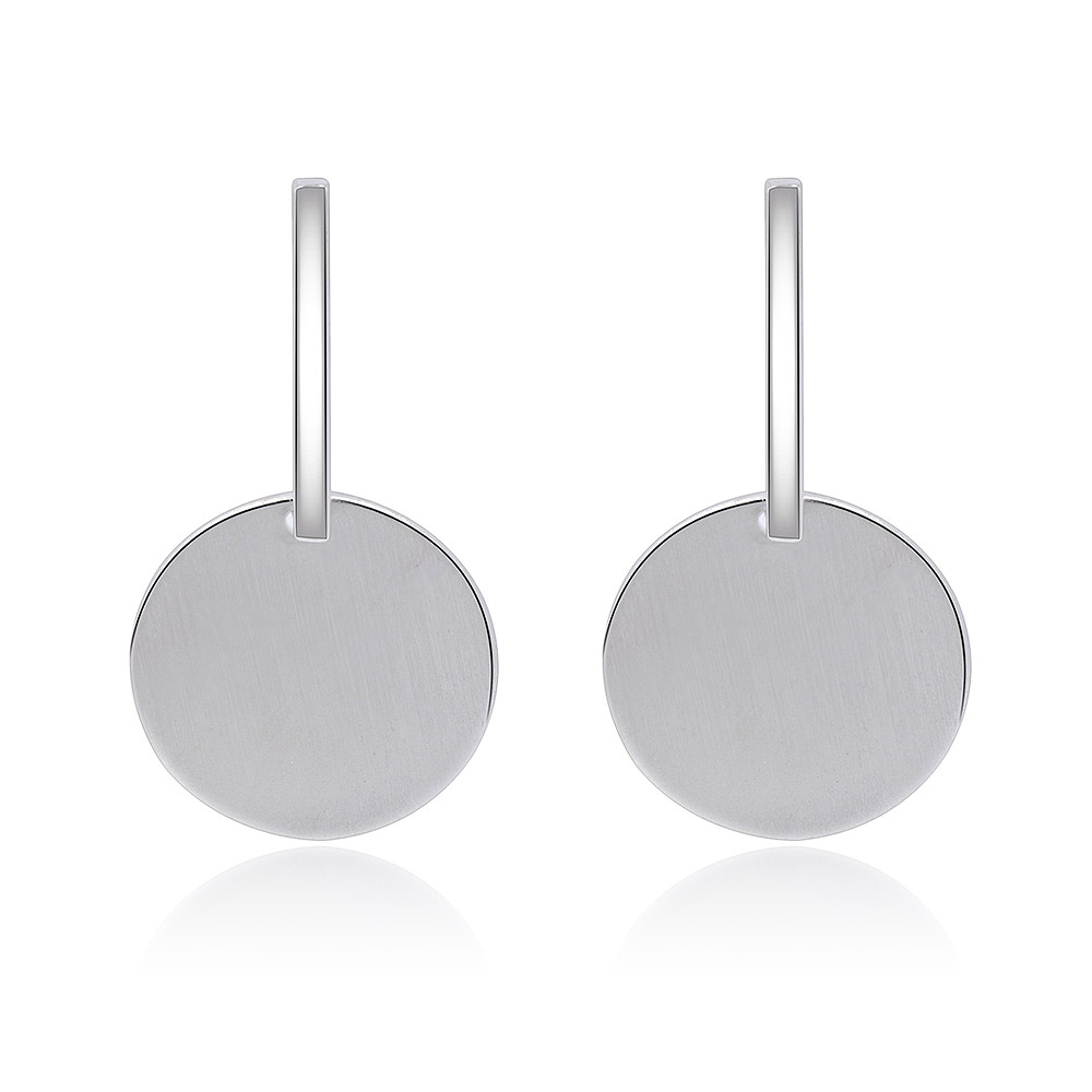 Front view of Oxidized Asymmetrical Earrings, featuring a minimalist design with flat, round silver discs and cylindrical hooks.