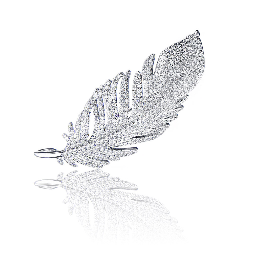 Elegant Statement Leaf Branch Brooch with sparkling cubic zirconia stones, showcasing its intricate feather-like design.