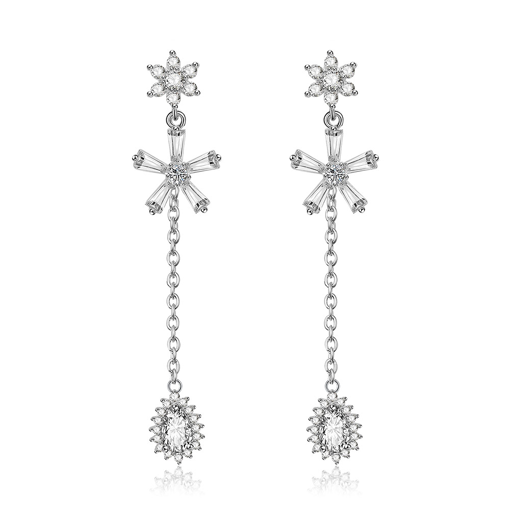 A pair of Clear Pear Drop Dangle Chandelier Earrings with an intricate floral and stellar design, crafted from rhodium-plated brass and adorned with sparkling clear AAA cubic zirconia stones.