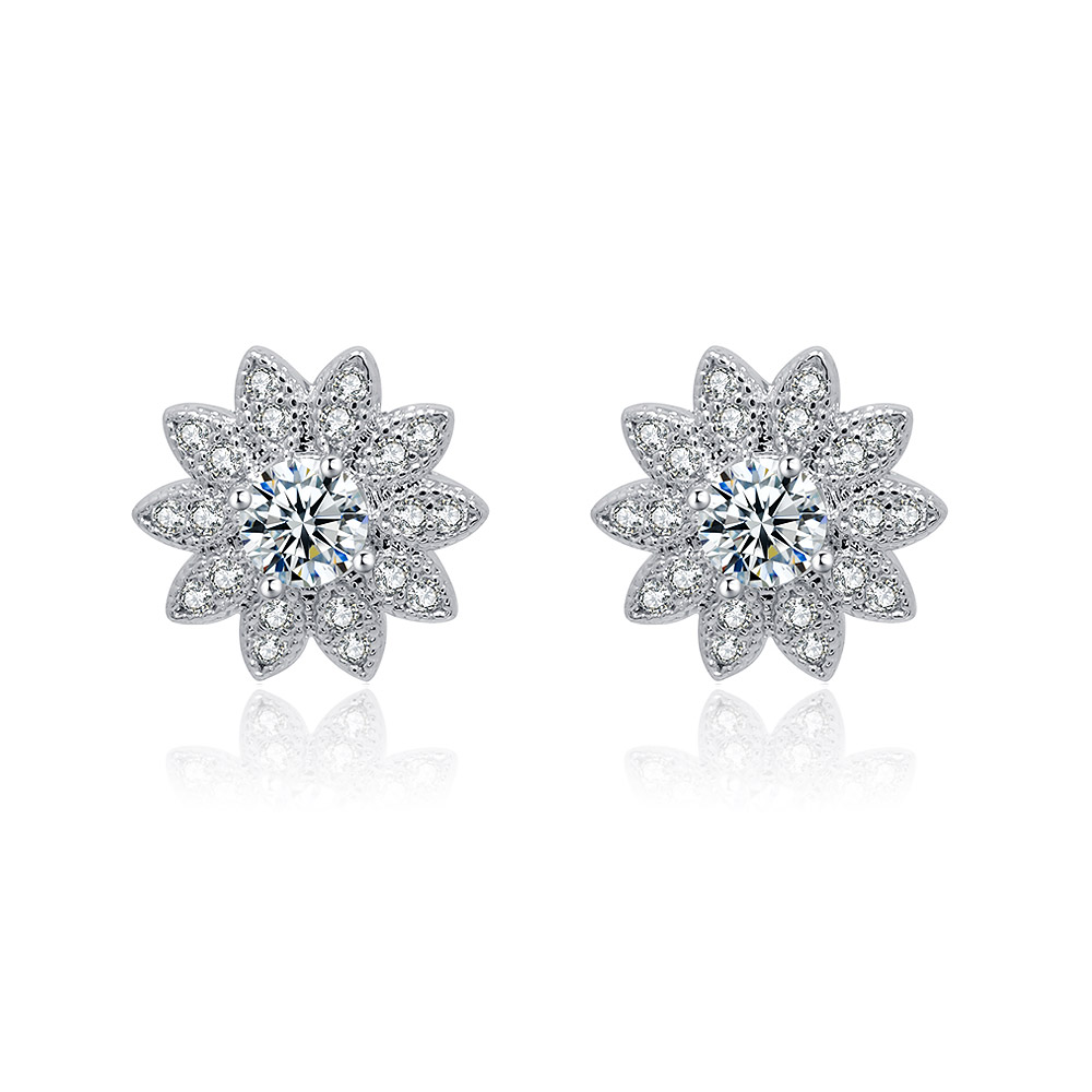 A close-up of the Cubic Zirconia Sunflower Button Earring, showcasing its intricate silver floral design with a central sparkling cubic zirconia stone surrounded by smaller stones.