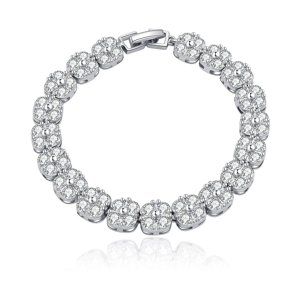 A rhodium-plated cubic zirconia tennis bracelet with sparkling gemstones arranged in a classic, elegant pattern on a white background.