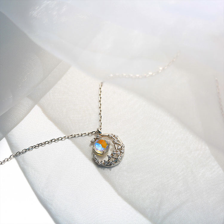 Close-up of a 925 sterling silver necklace from the celestial set, featuring a beautiful iridescent moonstone pendant.