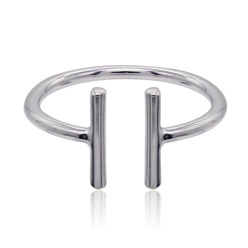 A close-up of the Dainty Open Ring, showcasing its polished rhodium-plated brass finish and minimalist open design with two vertical bars.